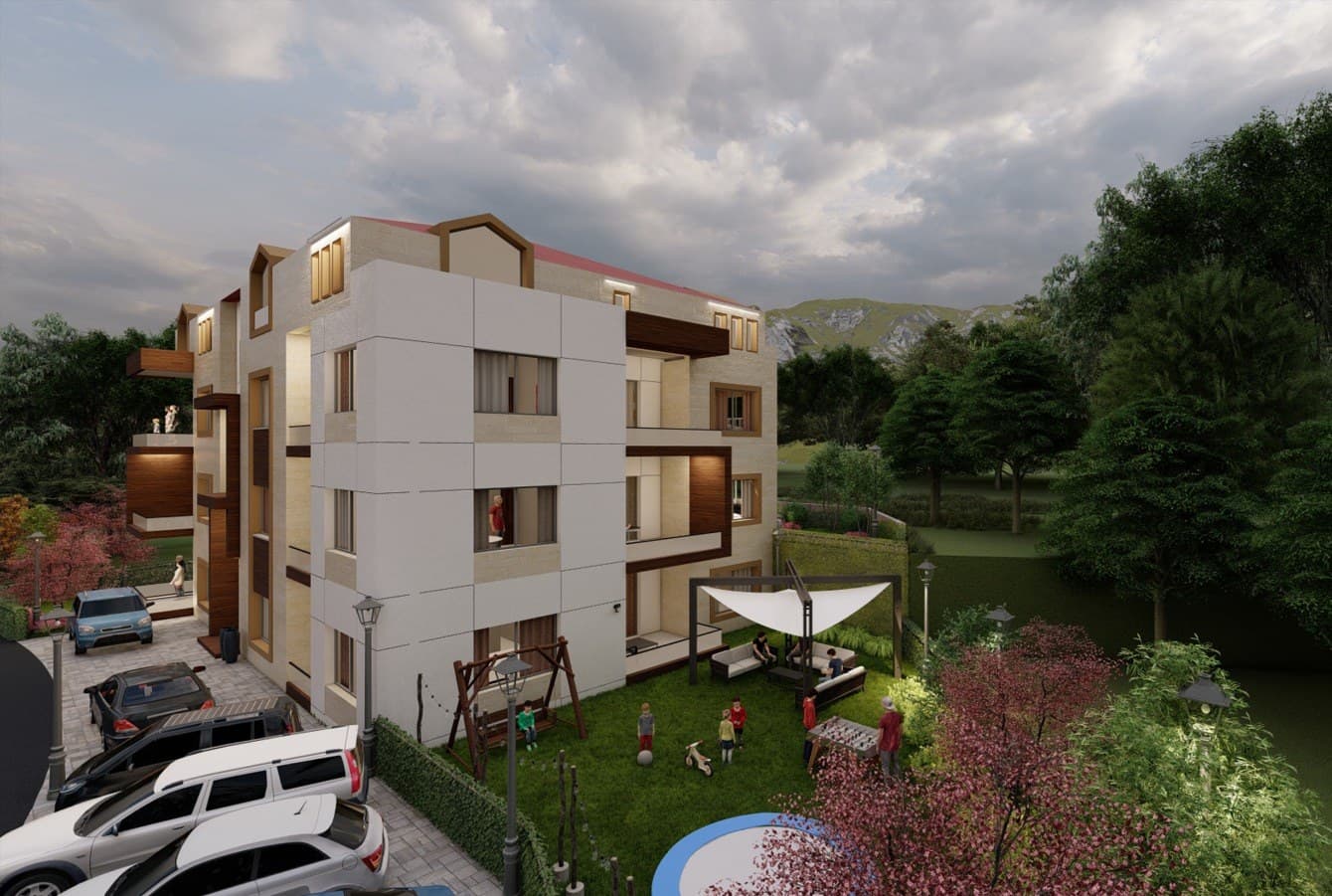 Landscaped garden at Ainwzein Residence 01 with shaded seating and a family pool